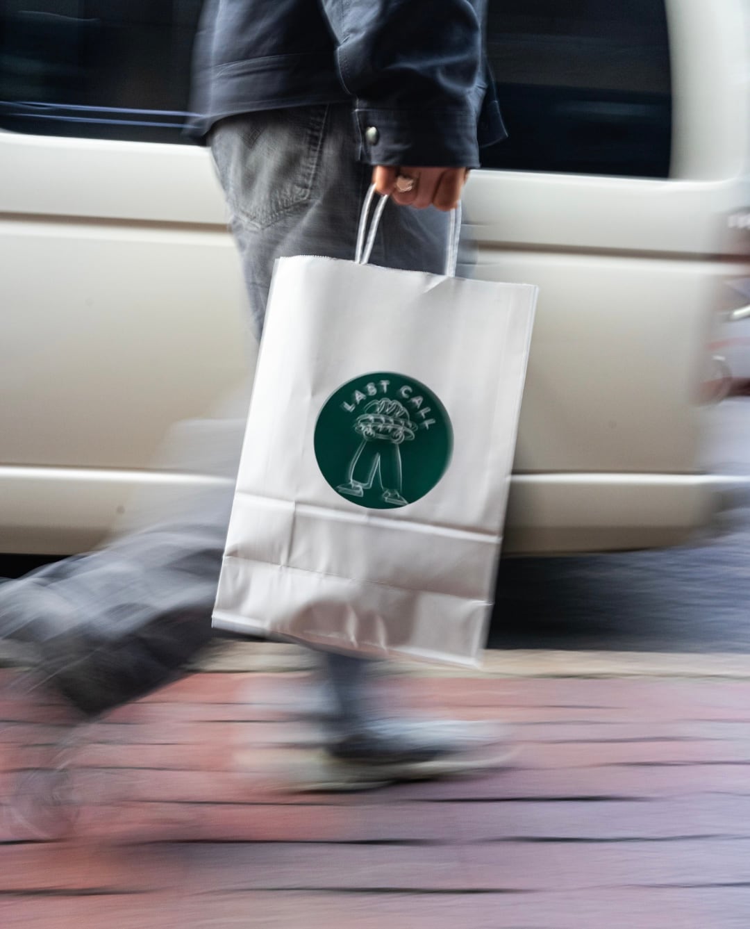 A Last Call bag being carried through the city